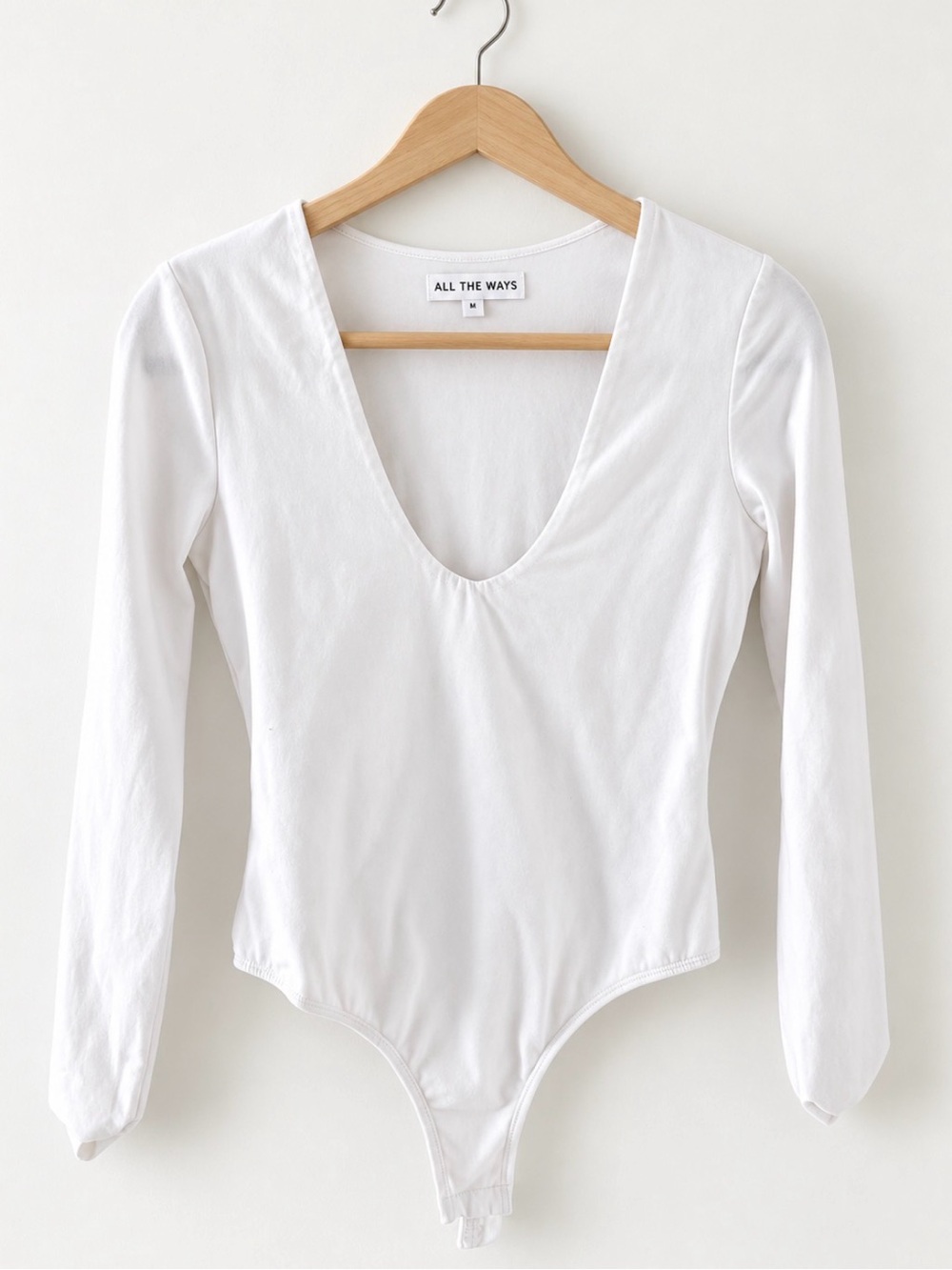 All the ways White Long-Sleeve V-Neck Bodysuit